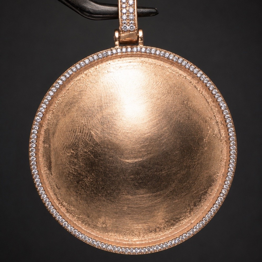 Custom rose gold pendant with diamond-set bezel, bespoke commission